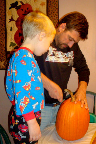 Carving Pumpkins 2010 - Teacher and Little Guy