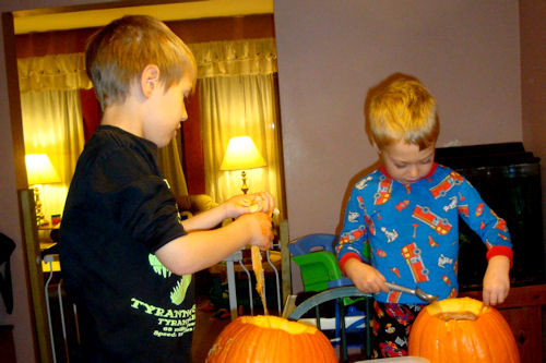 Carving Pumpkins 2010 - Z-Man and Little Guy Scooping Goop