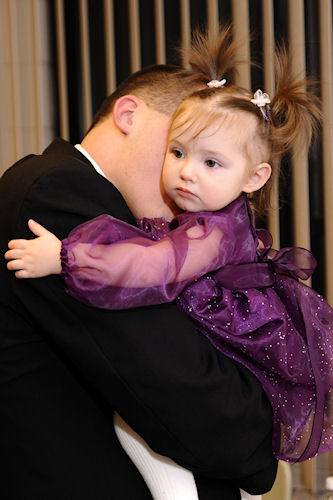 Cowboy Nuzzles Flower Girl Peanut