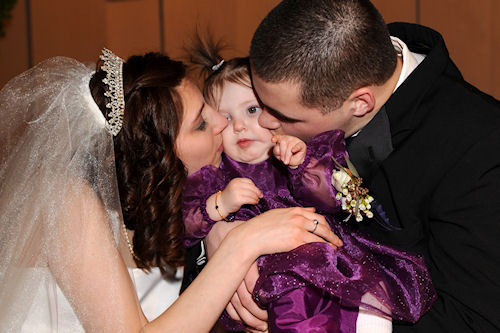 Flower Girl Peanut Gets a Squisy-Face Kiss