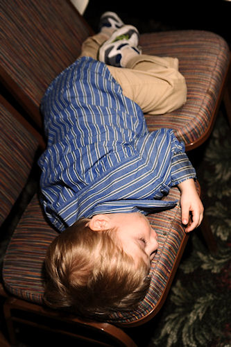 Wedding Reception - Little Guy Sleeping on Chair