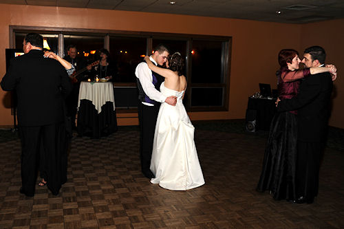 Wedding Reception - Newlyweds and Parents Dancing