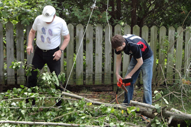 Storm - Grandpa and College Boy Working