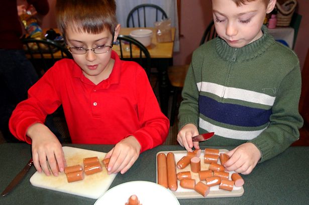 Mini Corndog Muffins - Boys Cutting Hot Dogs