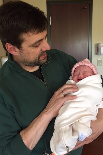 Meet Punkin - Teacher Holding Newborn Punkin